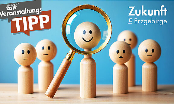 Holzfiguren als Personen mit Lupe
